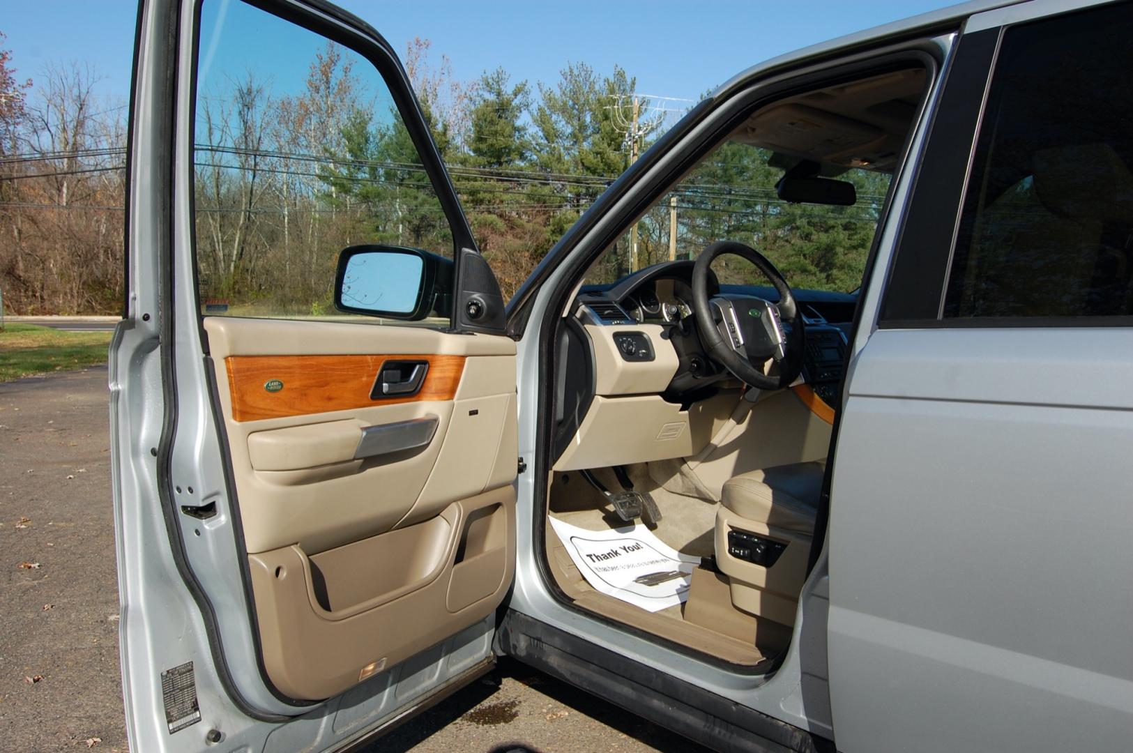 2009 Silver /Beige Leather Land Rover Range Rover Sport HSE (SALSK25419A) with an 4.4L V8 DOHC 32V engine, Automatic transmission, located at 6528 Lower York Road, New Hope, PA, 18938, (215) 862-9555, 40.358707, -74.977882 - Here we have a nice Range Rover Sport with a 4.4L V8 putting power to all four wheels via an automatic shifting transmission. The interior offers beige leather with wood trim, keyless entry, dual climate controls, heated seats front and back, AM/FM/CD/AUX radio with navigation, Harman/Kardon speaker - Photo#10